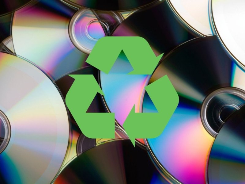 CDs und das Recycling-Logo.