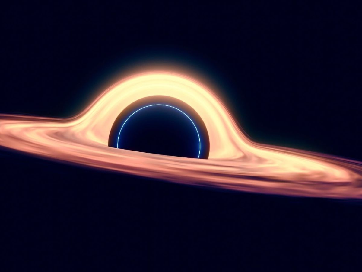 Darstellung eines Schwarzen Lochs mit erkennbarer Akkretionsscheibe im Weltraum.